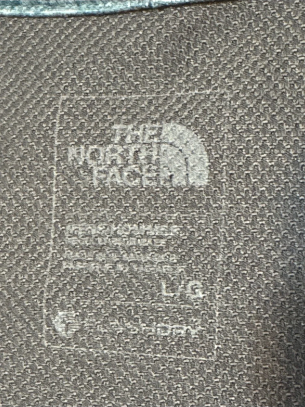 The North Face Men's Heathered Blue V‑Neck Performance Tee dark blue Accents